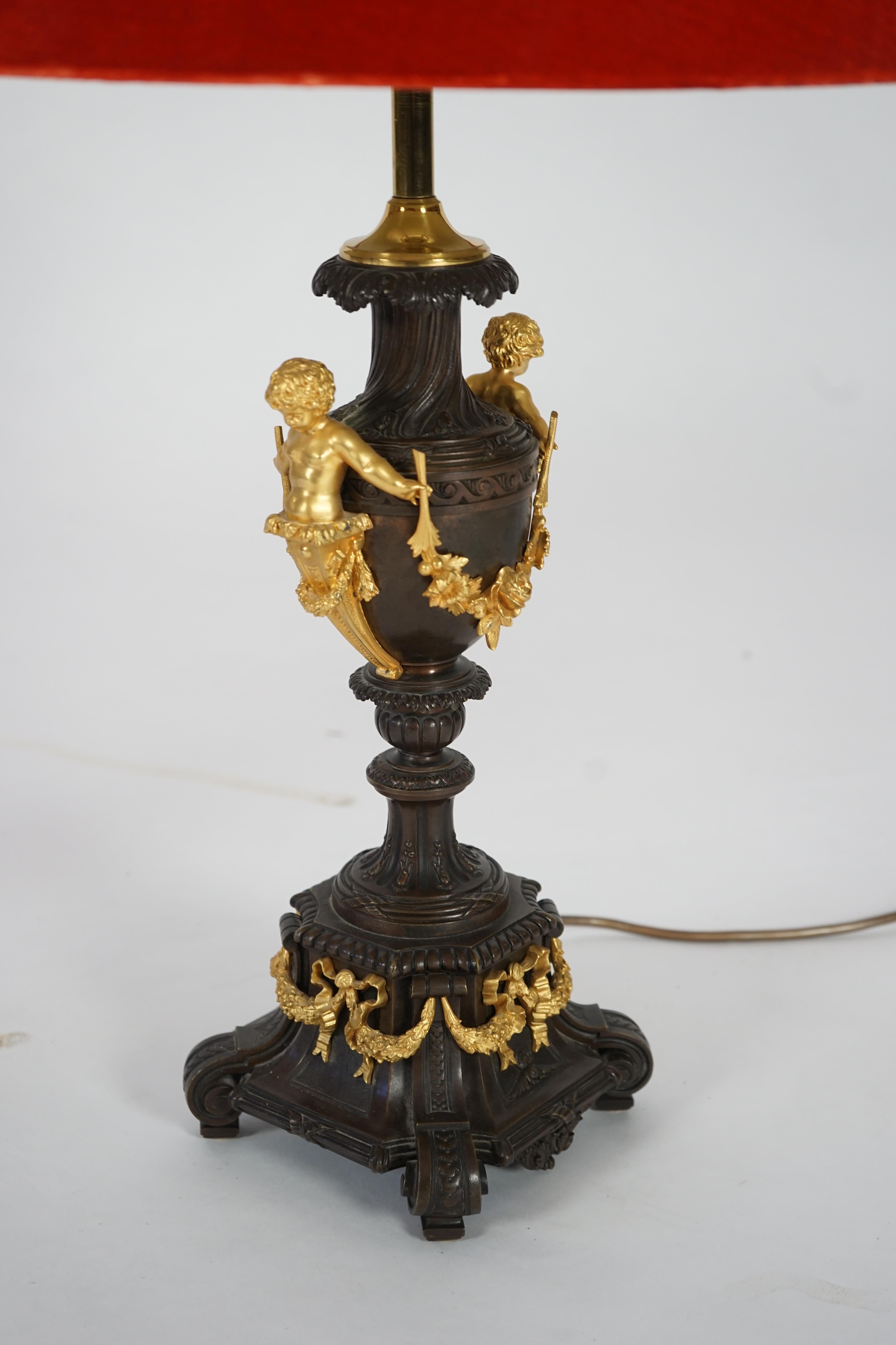 A pair of 19th century French bronze and ormolu table lamps